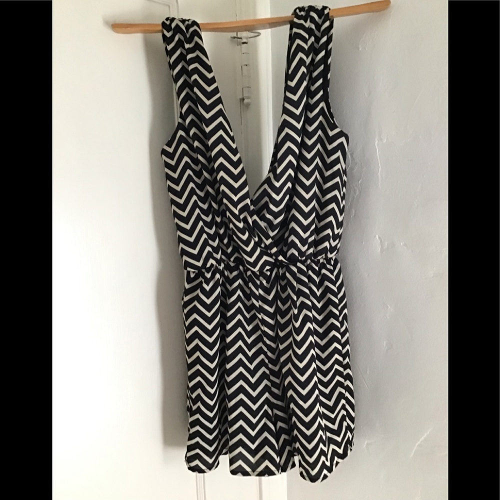 Mini dress low cut front and back.